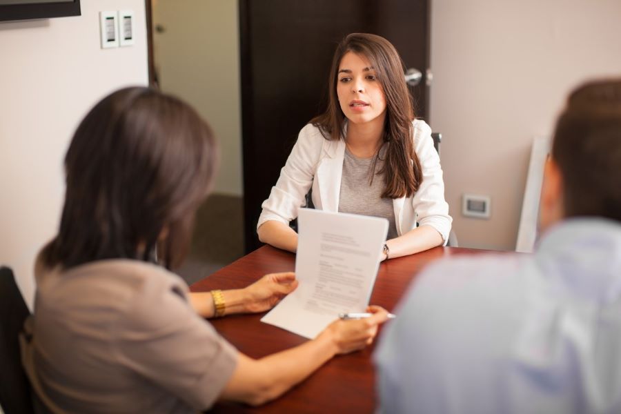 Hispanic woman in consulate interview